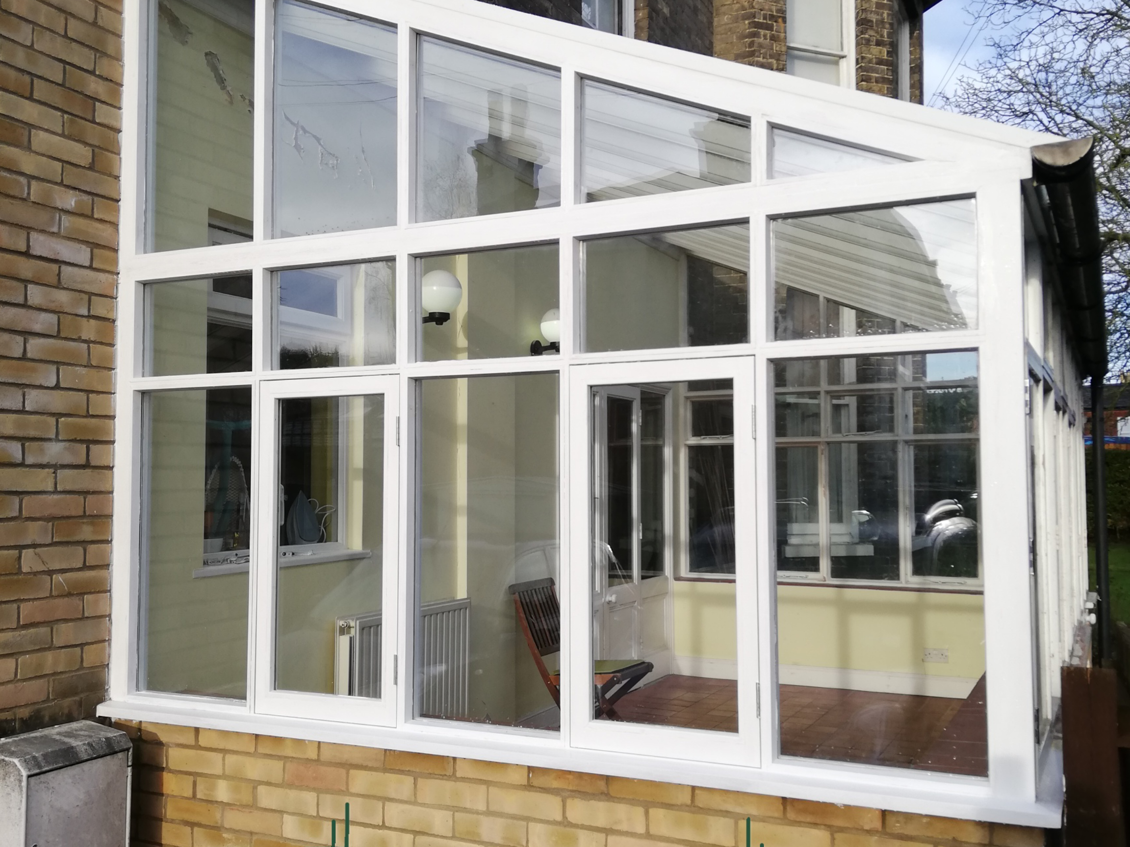 Timber conservatory fitting and replacement